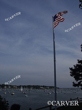 Windsnaps
A flag rippled by a stiff breeze. Marblehead harbor.
